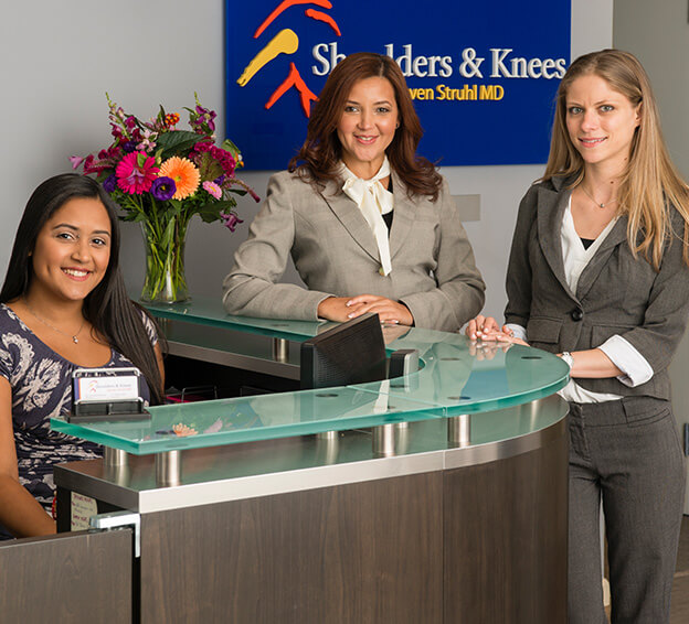 staff at the front desk at Shoulder and Knees surgery office